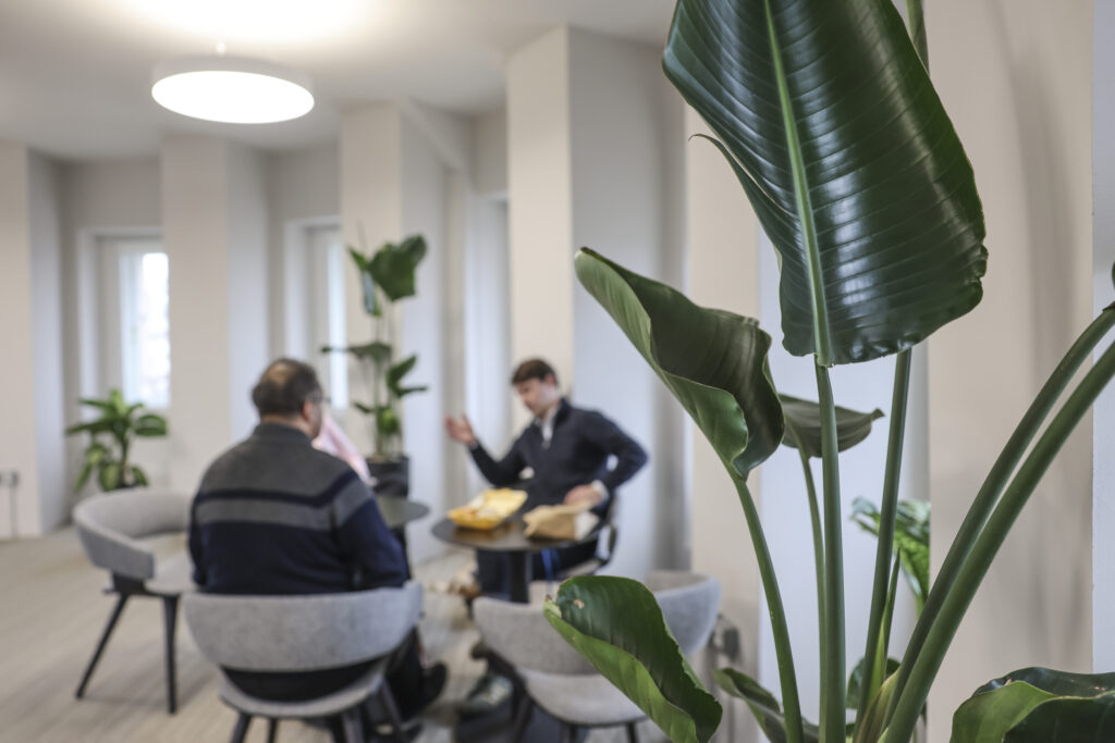 photo of a lunch meeting in a modern office setting