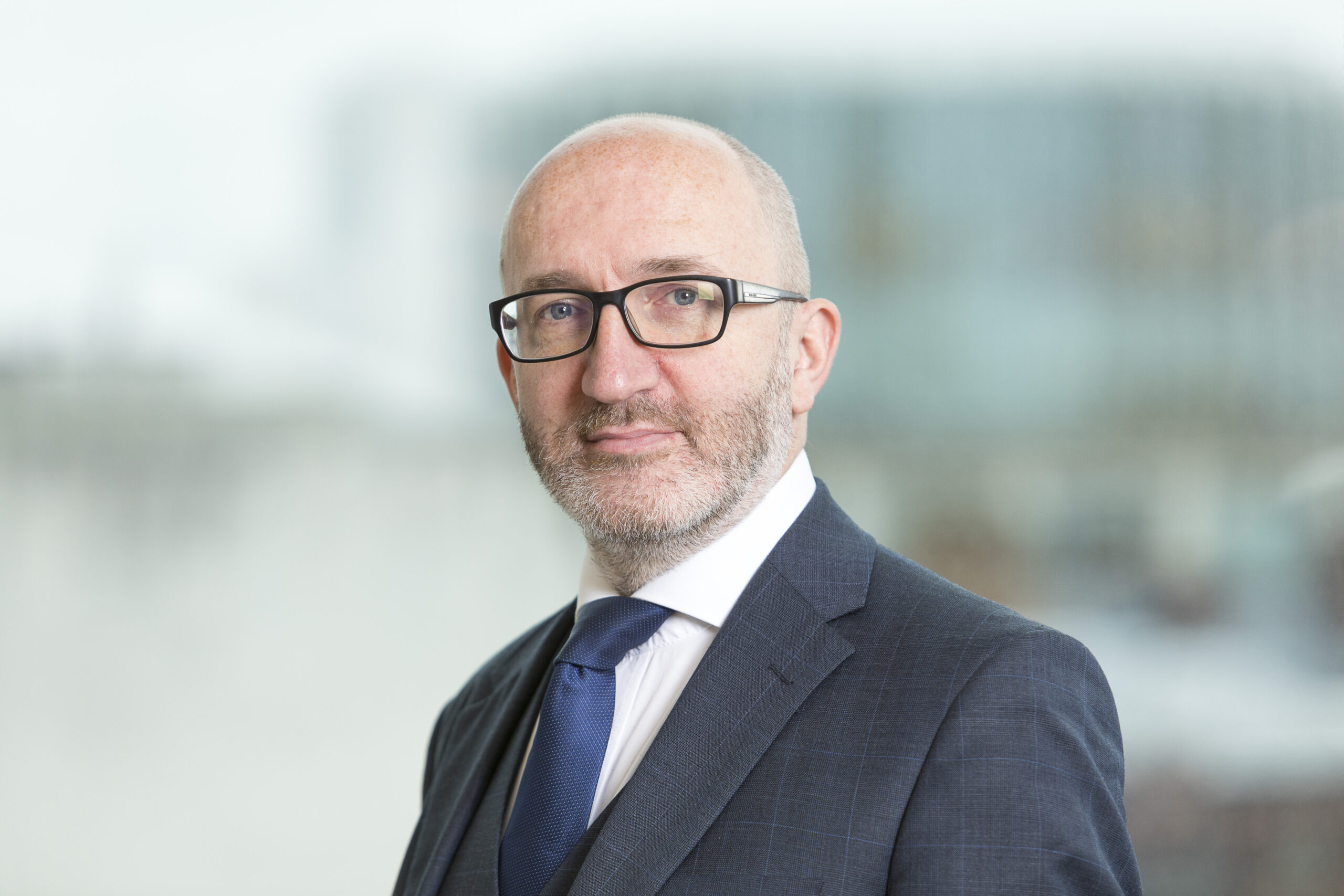 A headshot of Dom Brankin